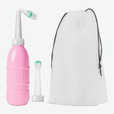 Douchette WC rose avec double tête : tête directe et tête courbée avec sac.