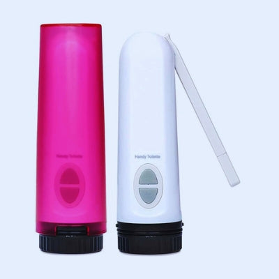 bidet portable rose avec la bouteille et le pulvérisateur